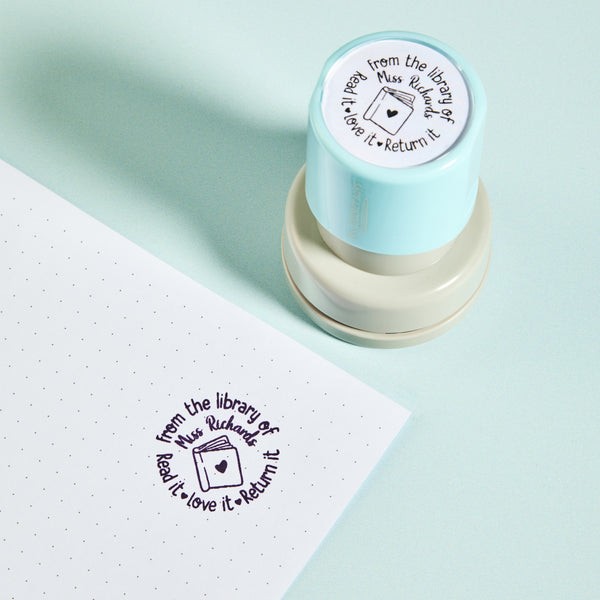 Library Book Stamp (From the library of) shown with the impression it prints