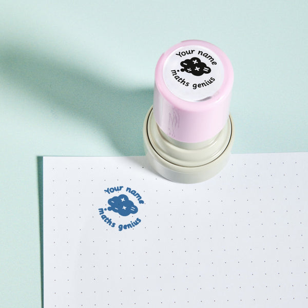 Maths Genius Stamp — the teacher marking stamp shown with its blue ink impression on dotted paper. My Teacher Says, handmade in Scotland.