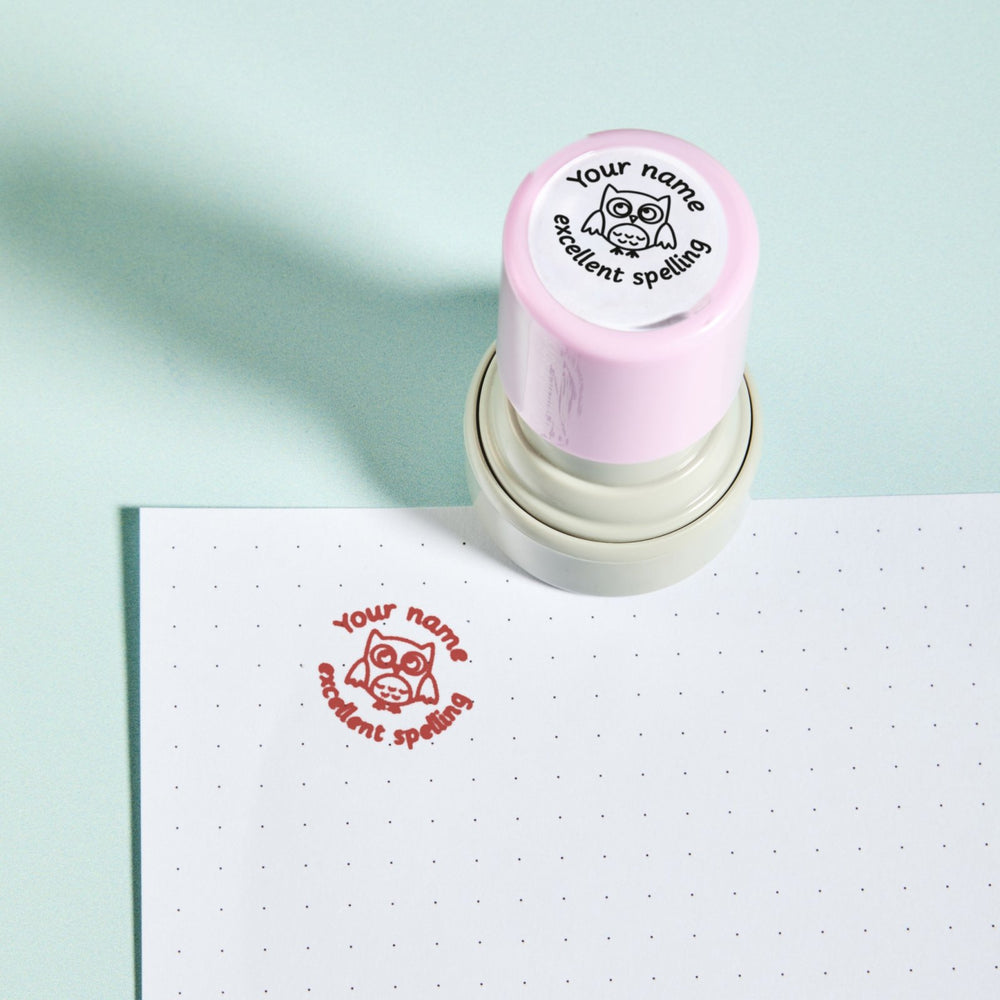 Excellent Spelling Stamp — the teacher marking stamp shown with its red ink impression on dotted paper. My Teacher Says, handmade in Scotland.