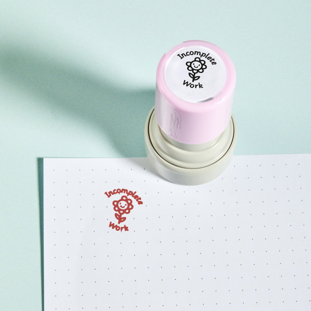 Incomplete Work Stamp — the teacher marking stamp shown with its red ink impression on dotted paper. My Teacher Says, handmade in Scotland.