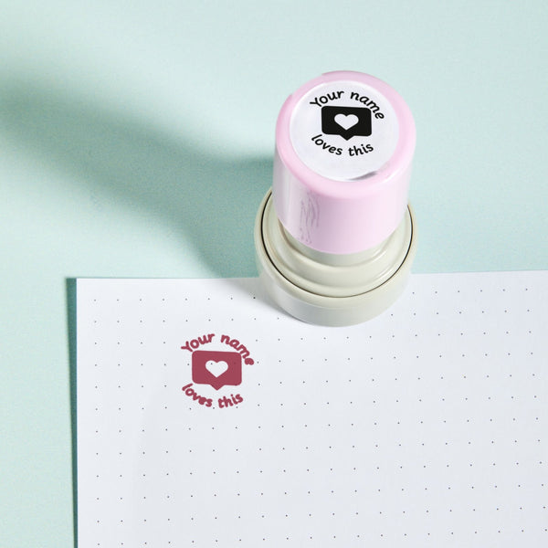 Love This Stamp — the teacher marking stamp shown with its pink ink impression on dotted paper. My Teacher Says, handmade in Scotland.