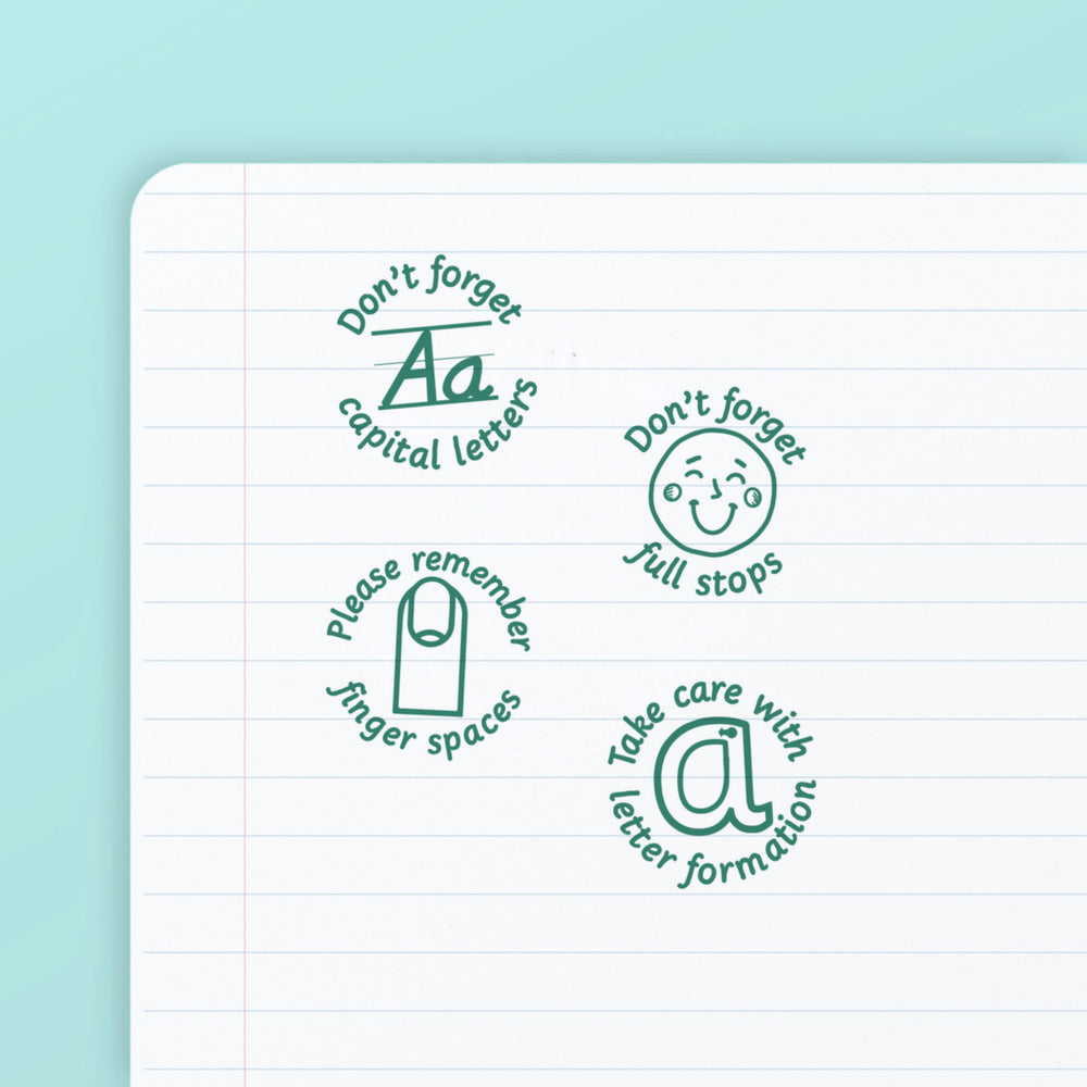 Literacy Set 2 - the four teacher marking stamps in the set, stamped in green ink on lined paper: capital letters, full stops, finger spaces and letter formation. My Teacher Says, handmade in Scotland.