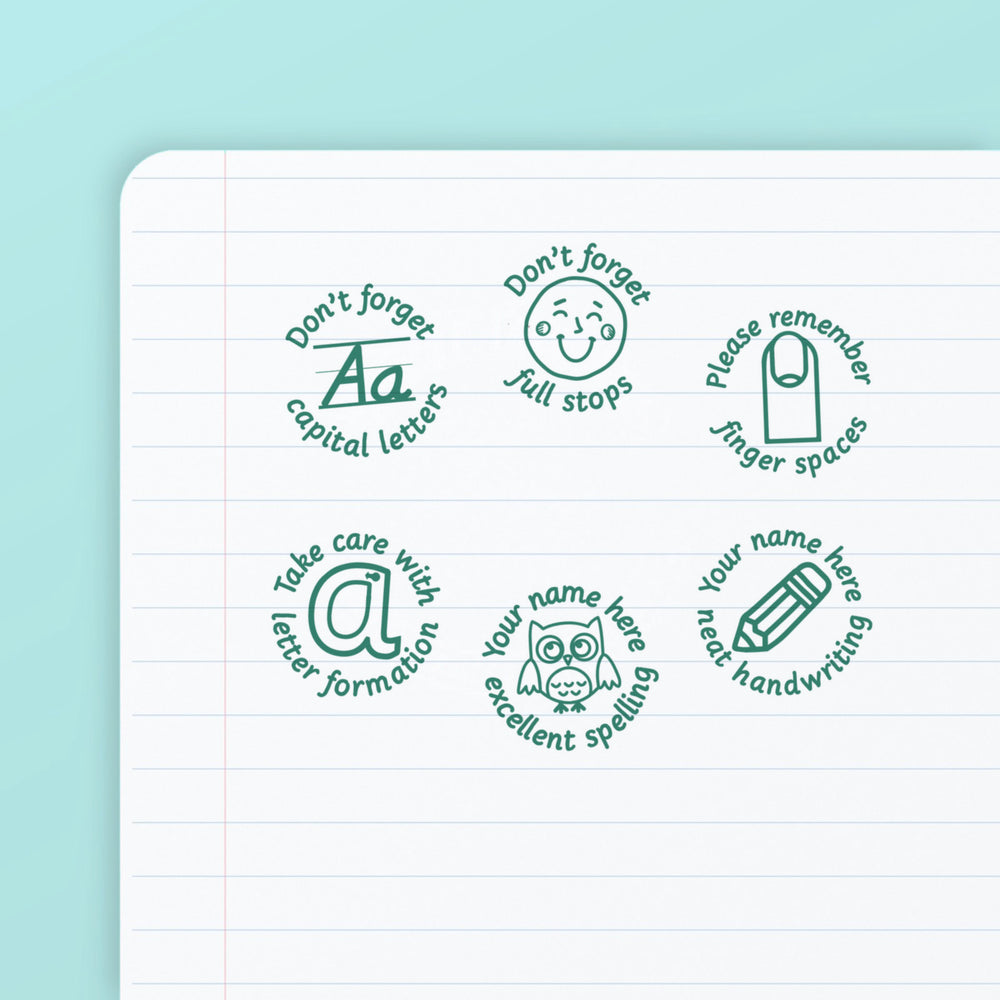 Literacy Set 3 - the six teacher marking stamps in the set, stamped in green ink on lined paper: capital letters, full stops, finger spaces, letter formation, excellent spelling and neat handwriting. My Teacher Says, handmade in Scotland.
