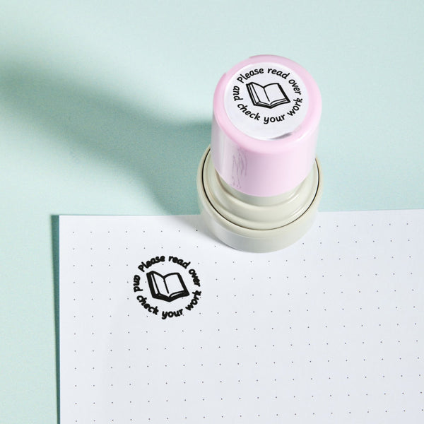 Read Over Your Work Stamp — the teacher marking stamp shown with its black ink impression on dotted paper. My Teacher Says, handmade in Scotland.