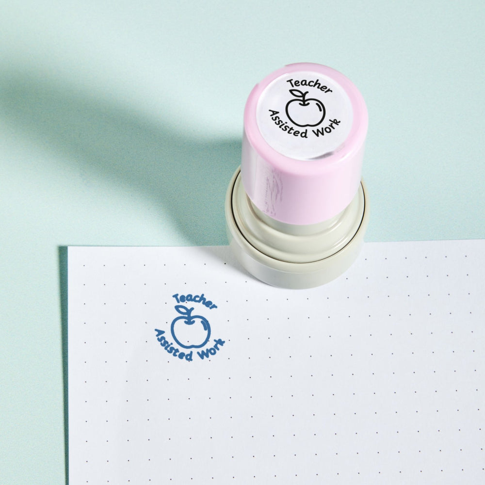 Teacher Assisted Stamp — the teacher marking stamp shown with its blue ink impression on dotted paper. My Teacher Says, handmade in Scotland.